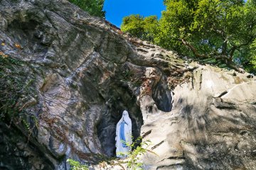 <p>Mary at the cave of Lourdes</p>
