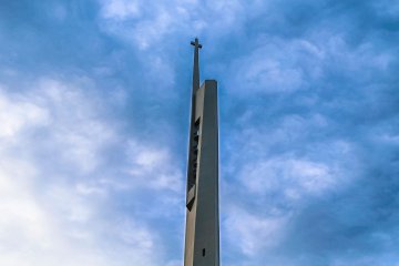 <p>Bell tower and cloudy sky</p>