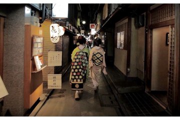 <p>Two Maikos&nbsp;Walking Down&nbsp;Pontocho, Kyoto, Japan</p>