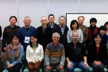 Some members take a quick photo after one of the monthly English study meetings.&nbsp;