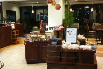 <p>The stands with baked products to take away are nearest the entrance, and seats commanding great views are at the back.</p>