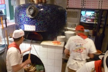 Staff hard at work cooking the perfect pizza