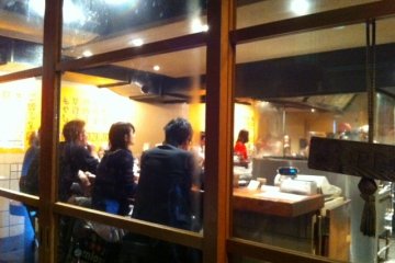 The view from the fast-moving queue outside