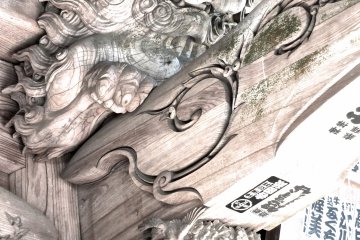 <p>Under the eave of the temple roof, a dragon (of sorts) lurks...</p>