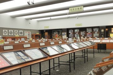 A wide range of notes and coins on display.