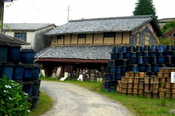 <p>Stacks of pots beside the driveway</p>