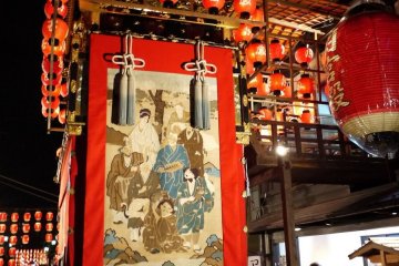 <p>The floats are hung with beautiful and valuable tapestries</p>