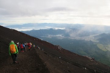 People climbing down
