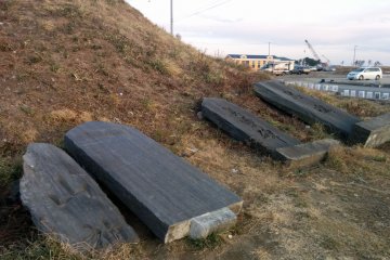 <p>These aged stone tablets were collected from an old temple after the tsunami and placed on the back of the hill. Past generations wrote a warning &nbsp;that this area is prone to tsunamis.&nbsp;</p>