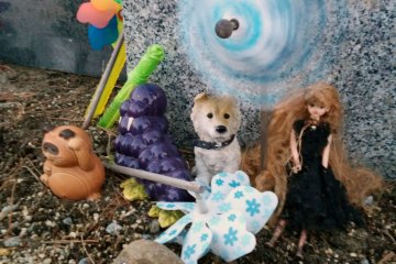 <p>Children's toys left at the memorial.</p>