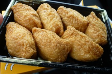 vinegared rice balls covered in sweet fried bean curd, tastes better than it sounds!
