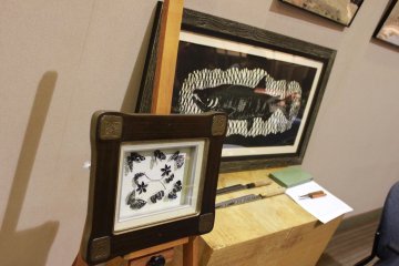 <p>Among Chef Sato's many talents, he also is skilled at cutting extremely intricate designs and pictures out of paper using only kitchen knives.&nbsp;</p>