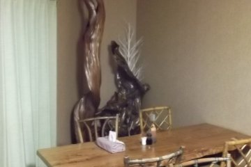 <p>Wooden furniture in the dining area</p>