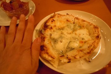 <p>Twenty centimeters is not substantial but good for your waist, and due to the puffiness of the crust, and ample cheese topping, it is actually filling</p>
