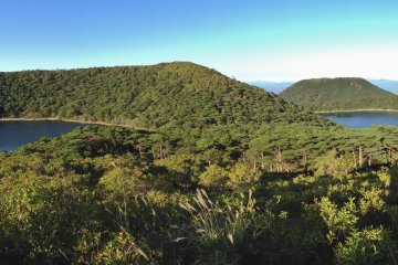 <p>Panorama with Byakushi Pond (left), Rokukannon Pond (right), and the flat-topped Mt. Koshiki behind it</p>