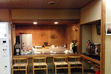 <p>An intimate yet understated sushi bar counter awaits you at Hotel Yoshida</p>