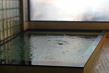 <p>A soothing bath awaits you from the communal bath or sento on the top of Hotel Yoshida Maizuru</p>