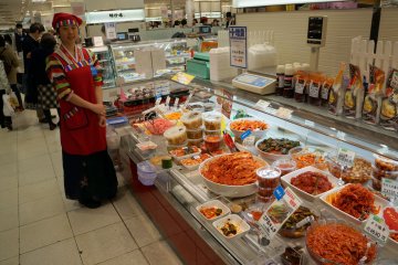 <p>If you'd like some authentic kimchi, you can usually always find a vendor. Samples are available most of the time here</p>