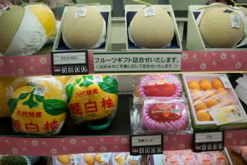 <p>No food basement trip would be complete without checking out the high end fruit. The Japanese like to give these as gifts. Two mango for 4800 Yen, and a cantaloupe for 5800 Yen in a nice box</p>