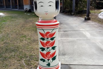 <p>A plus-sized kokeshi doll welcomes you as you approach the front entrance.&nbsp;</p>