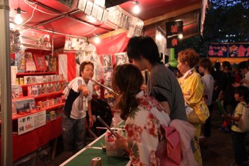 Girls clad in Yukata playing games