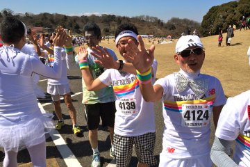 Happy finishers cheering us on at The Color Run 5K in Japan