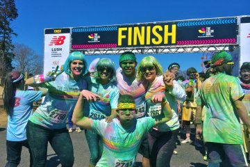Our team at the Finish line plastered in color!