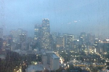<p>Roppongi's&nbsp;high-rises shine on a rainy spring evening in Tokyo.</p>