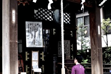 <p>This young man has just finished praying</p>
