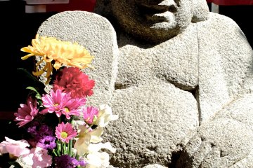 <p>A Buddhist statue soaking up the sunshine</p>