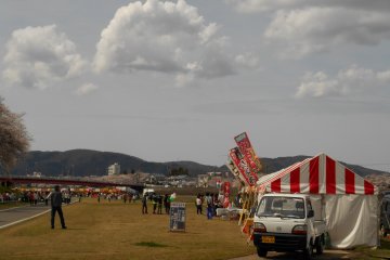 <p>There are food stands on the riverbank for the occasion</p>