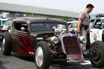 <p>Rat rod and a rising sun</p>