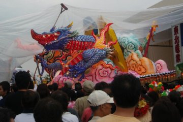 A float being bagged before the rain.