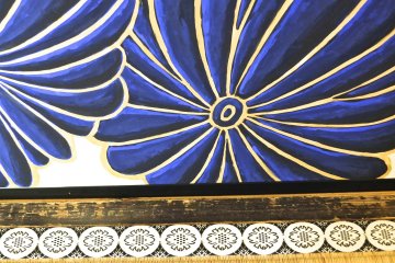 <p>Detail of a lotus painting near the tatami mat floor</p>