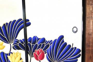 <p>Many of the lotus are painted right onto sliding doors</p>