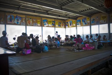 <p>One half of the beach house, windows all around</p>