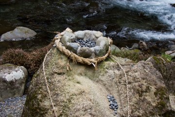 <p>It looks easier than it is. It is not a great distance; but the little stones like to jump out again even if you aimed well in the first place!</p>