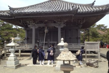 <p>Schoolchildren ring the bell</p>
