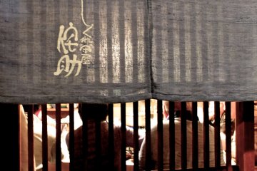 <p>Old friends take a break to enjoy a cup or two of sake</p>