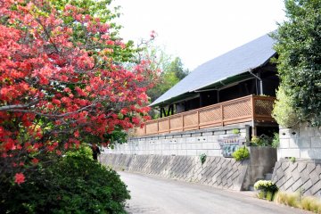 <p>This is the tea room/cafe. Inside there is also an shop area full of flower-covered souvenirs, homemade jams, teas, and more.</p>