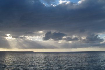 <p>Sun setting on a beautiful day in paradise.</p>
