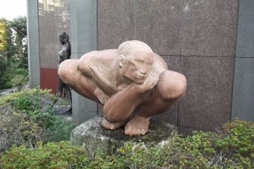 <p>This chap keeps an eye on you as you walk past the building to the garden</p>