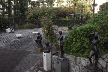 <p>Steps lead down to the garden behind the building</p>