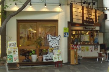 <p>From the outside you can see the cartoon representation of the owner, who likes cowboys, and the "take out" window.</p>
