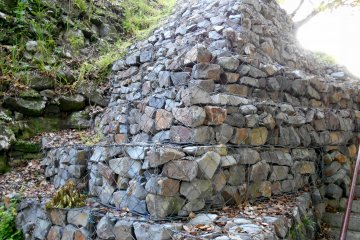 <p>Stone wall along the path leading up to the Castle Keep Ruins</p>