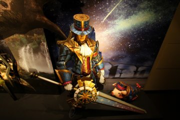 <p>I'm guessing he is from the guild.&nbsp;</p>