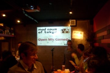 Having a few drinks before the action starts on comedy night