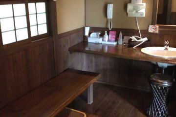 Dressing room of your own private bath. It is equipped with&nbsp;a hair dryer and bottles of moisturizer.