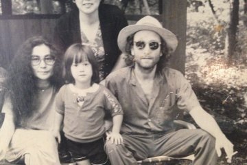<p>John Lennon, Yoko Ono and Sean relaxing one afternoon in 1979 at Rizanbo. The lady in the background is the owner and still works there today. The picture hangs on the wall with many more of John playing in the grounds with Sean</p>