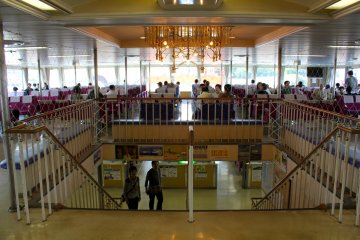 A view of one of the larger seating areas on the upper deck of the ferry.